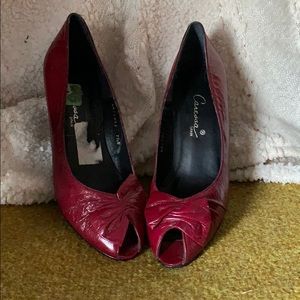Dark red peep toe pumps